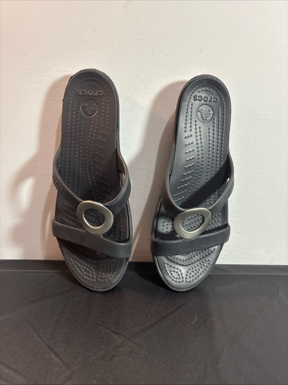 CROCS Women's Black Slide Sandals with Silver Ring Accent. 10/6